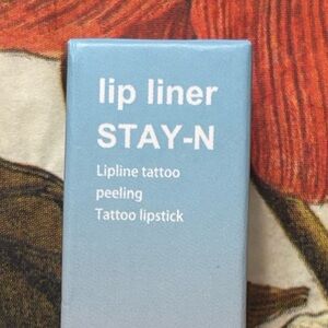 OUHOE Lip Liner STAY-N tattoo peeling lip liner in shade Cool Cocoa